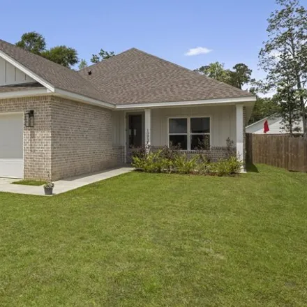 Buy this 3 bed house on 10822 Kapalama Drive in Diamondhead, MS 39525