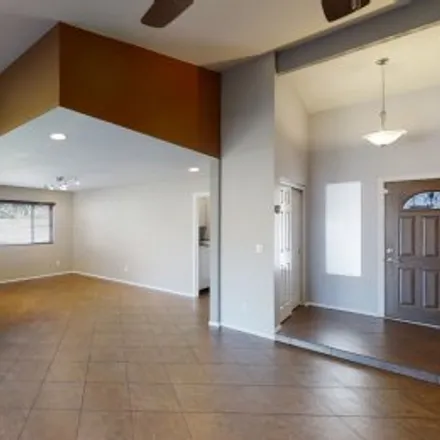 Rent this 4 bed apartment on 2218 West Palomino Drive in Orangetree, Chandler