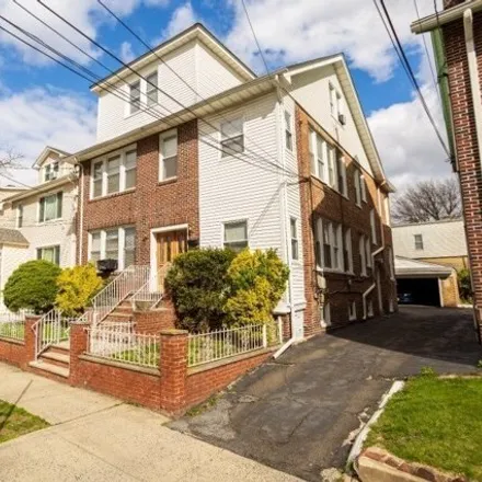 Buy this 8 bed house on 397 North 13th Street in Newark, NJ 07107