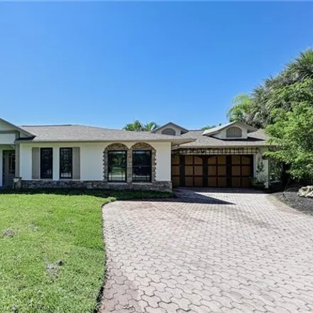 Buy this 4 bed house on 27299 Harbor Drive in Highland Woods Golf & Country Club, Bonita Springs