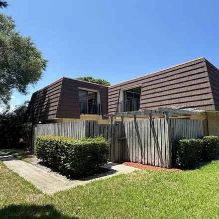 Rent this 2 bed townhouse on 2199 21st Lane in Palm Beach Gardens, FL 33418
