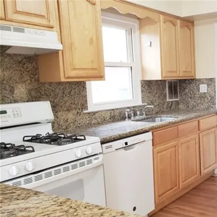 Rent this 3 bed house on 15-39 208th Street in New York, NY 11360