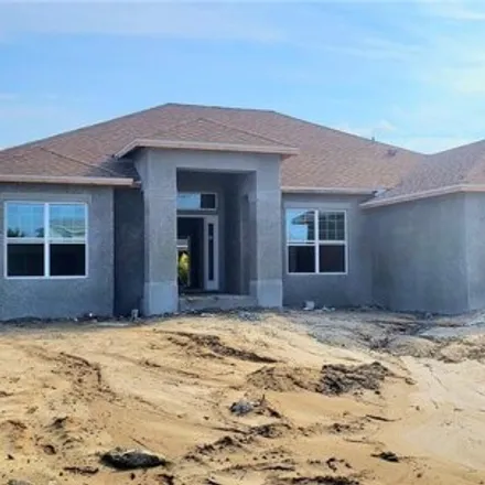 Buy this 4 bed house on 3519 East Gator Circle in Cape Coral, FL 33909