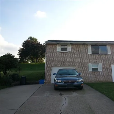 Rent this 3 bed townhouse on 36 Windcrest Drive in Bishop, Cecil Township