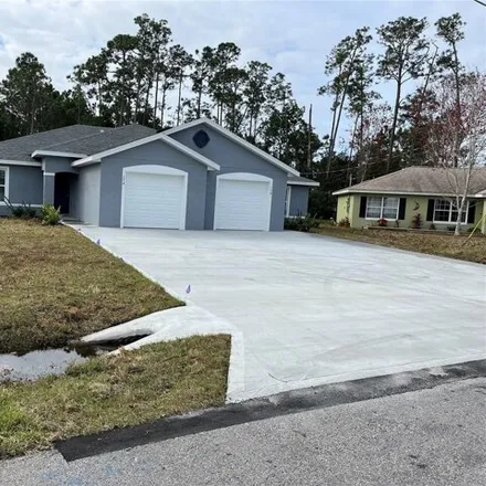 Rent this 3 bed house on 11 Freneau Lane in Palm Coast, FL 32137