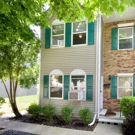 Rent this 3 bed townhouse on 186 New Street in Orange, NJ 07050
