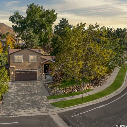 Buy this 4 bed house on 7319 3170 East in Cottonwood Heights, UT 84121