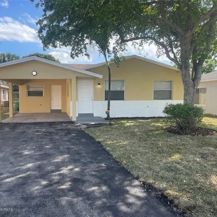 Buy this 4 bed house on 2910 Northwest 7th Street in Washington Park, Broward County