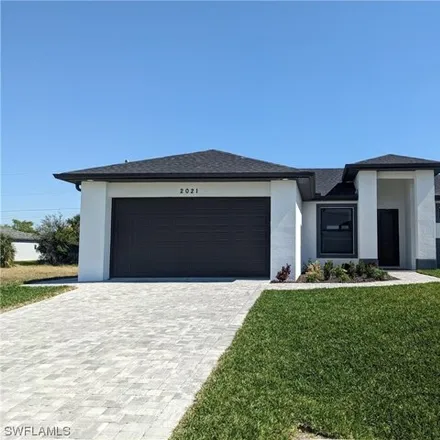 Buy this 3 bed house on 2021 NE 13th Ave in Cape Coral, Florida
