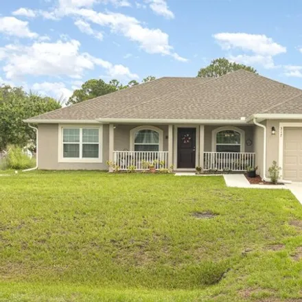 Buy this 3 bed house on 317 Galena St SW in Palm Bay, Florida