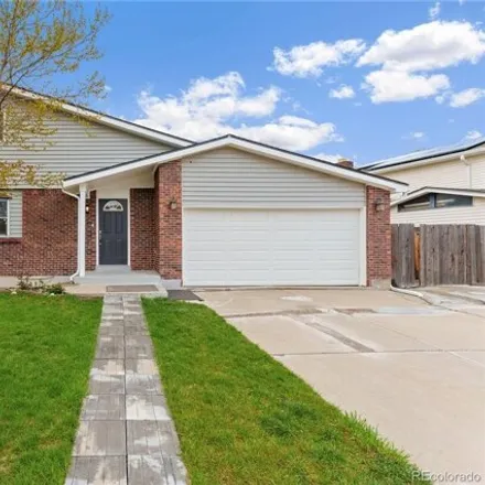Buy this 4 bed house on 13890 West 76th Avenue in Arvada, CO 80005