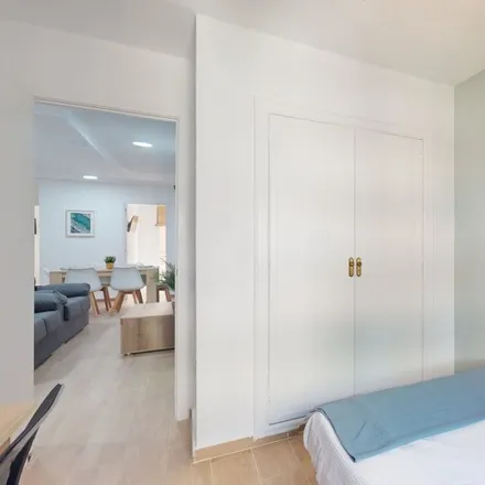 Rent this 6 bed room on Plaça de Vicent Iborra in 46001 Valencia, Spain