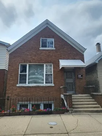 Rent this 3 bed house on 2832 S Emerald Ave Unit 1 in Chicago, Illinois