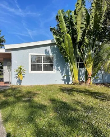 Rent this 4 bed house on 460 Rutgers Avenue in Melbourne, FL 32901