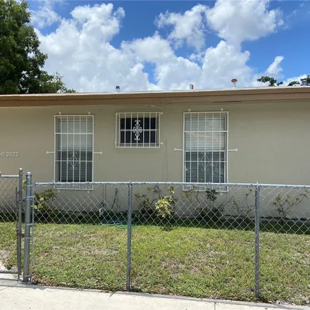 Buy this 3 bed townhouse on 3794 Northwest 213th Terrace in Lakewood Estates, Miami Gardens