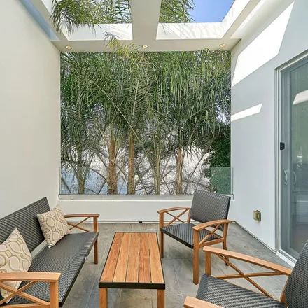 Rent this 5 bed apartment on 617 South Mansfield Avenue in Los Angeles, CA 90036