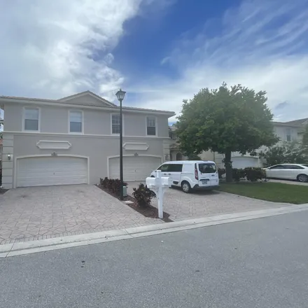 Buy this 3 bed townhouse on 5111 Meadow Oaks Drive in Coconut Creek, FL 33073