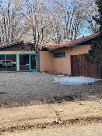 Buy this 4 bed house on 207 Siler Road in Taos, NM 87571