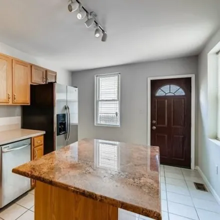 Rent this 2 bed house on 1704 South Charles Street in Baltimore, MD 21230