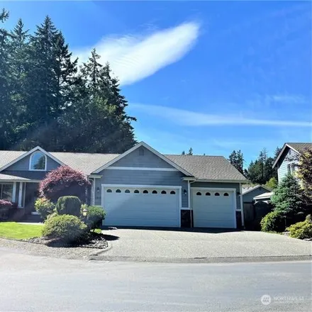 Buy this 3 bed house on 11817 10th Avenue Court Northwest in Pierce County, WA 98332