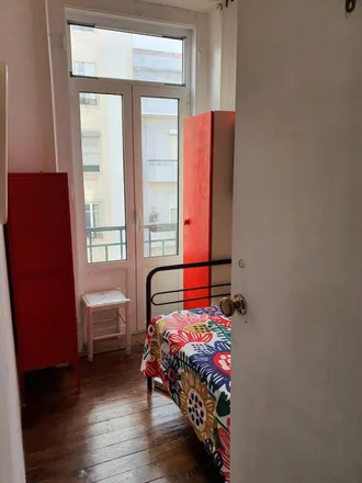Rent this 7 bed room on Rua Ângela Pinto in 1900-287 Lisbon, Portugal