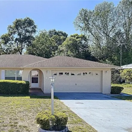 Rent this 3 bed house on 2427 Keeport Drive in Spring Hill, FL 34609