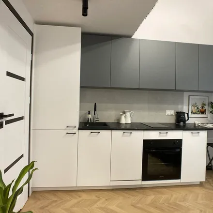 Rent this 1 bed apartment on Warsaw in Łopuszańska 38D, 02-232 Warsaw