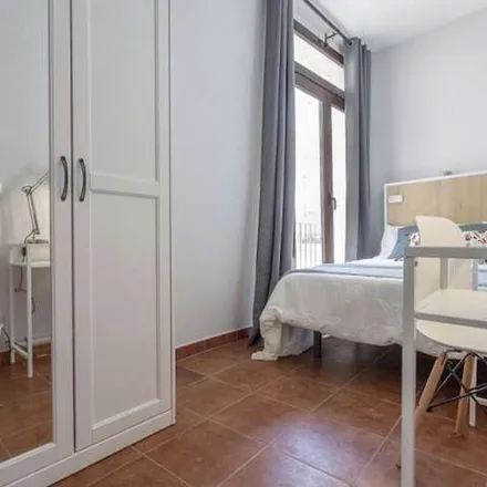 Rent this 14 bed apartment on Carrer dels Borges in 46003 Valencia, Spain