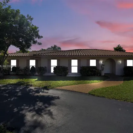 Buy this 4 bed house on 2400 Northwest 105th Terrace in Coral Springs, FL 33065