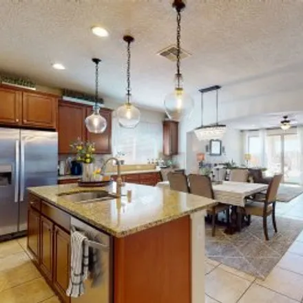 Buy this 4 bed apartment on 9513 Big Rock Drive Northwest in Paradise Hills Civic, Albuquerque