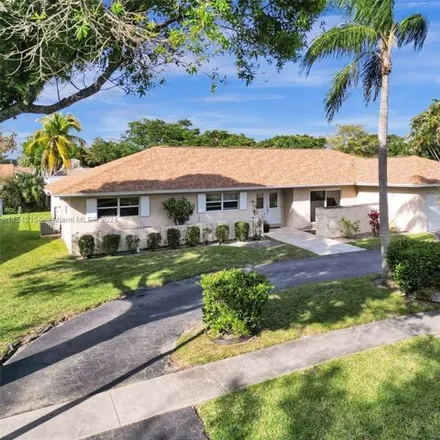 Buy this 4 bed house on 6807 Southwest 17th Street in Plantation, FL 33317