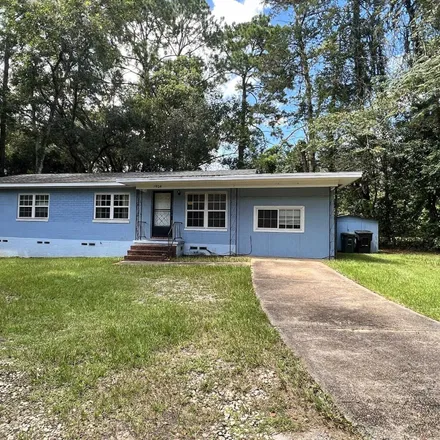 Rent this 4 bed house on 1904 Dahlia Drive in Tallahassee, FL 32304
