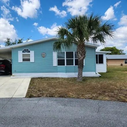 Buy this studio apartment on 6799 Sisonte Court in Saint Lucie County, FL 34951