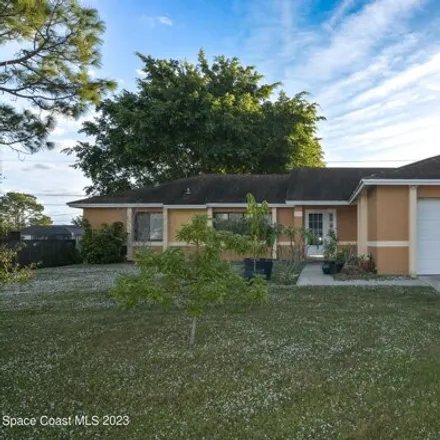 Buy this 3 bed house on 1653 Dallam Avenue Northwest in Palm Bay, FL 32907