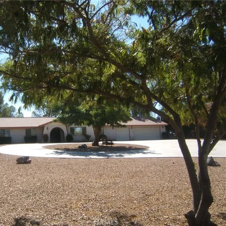 Rent this 3 bed house on 15123 Riverside Lane in Desert Knolls, Apple Valley