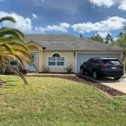 Rent this 4 bed house on 18 Lee Drive in Palm Coast, FL 32137