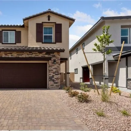 Rent this 4 bed house on Canary Song Drive in Henderson, NV 89011