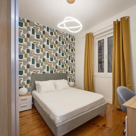 Rent this 8 bed room on Rua Cidade da Horta 36 in 1000-101 Lisbon, Portugal