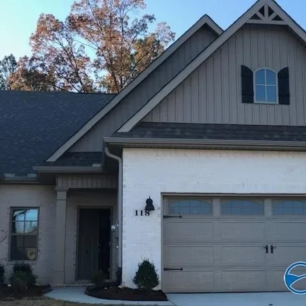 Rent this 3 bed townhouse on Farmall Lane in Madison County, AL 35742