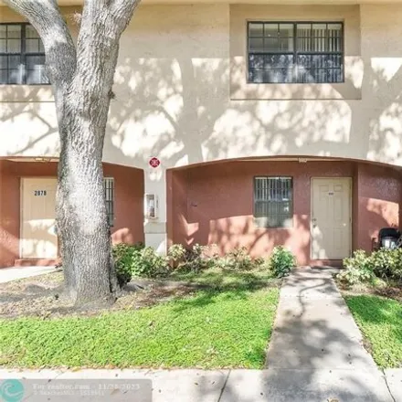 Buy this 2 bed townhouse on 2880 Coral Springs Dr Unit 2880 in Coral Springs, Florida