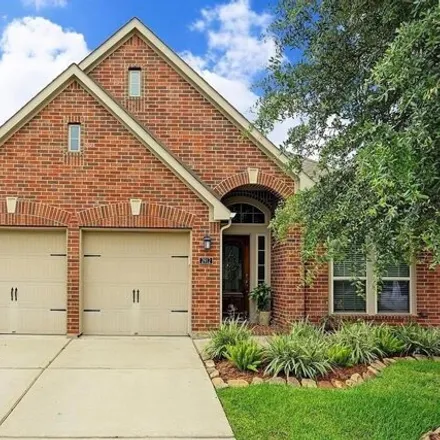Rent this 4 bed house on 2928 Silhouette Bay Drive in Pearland, TX 77584
