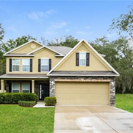 Buy this 4 bed house on 1506 Hoofprint Court in Lake County, FL 34731