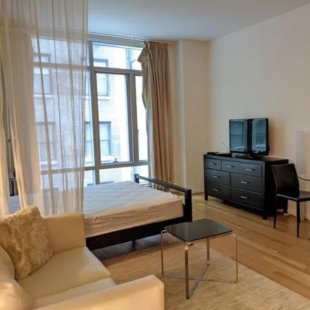 Buy this studio condo on The Centria in 18 West 48th Street, New York
