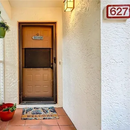 Buy this 2 bed condo on Serendipity Court in Pelican Bay, FL 34108