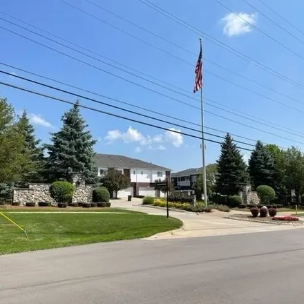 Buy this 2 bed condo on 6871 Boulder Pointe Drive in Washington Charter Township, MI 48094