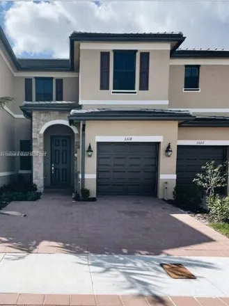 Rent this 3 bed house on West 112th Street in Hialeah, FL 33018