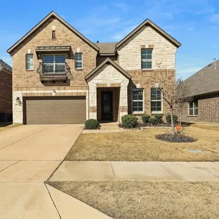 Rent this 4 bed house on 944 Mist Flower Drive in Denton County, TX 75068