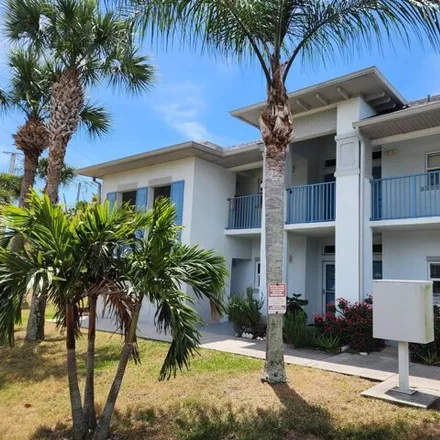 Rent this 2 bed condo on 111 Portside Ave Unit 102 in Cape Canaveral, Florida