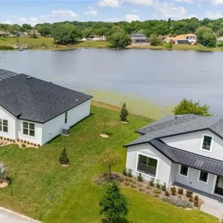 Buy this 4 bed house on 10619 Summit Lakes Lane in Clermont, FL 34711