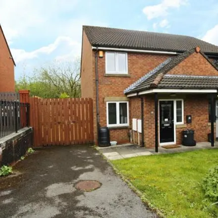 Buy this 2 bed duplex on Raikes Road in Farnworth, BL3 1SN